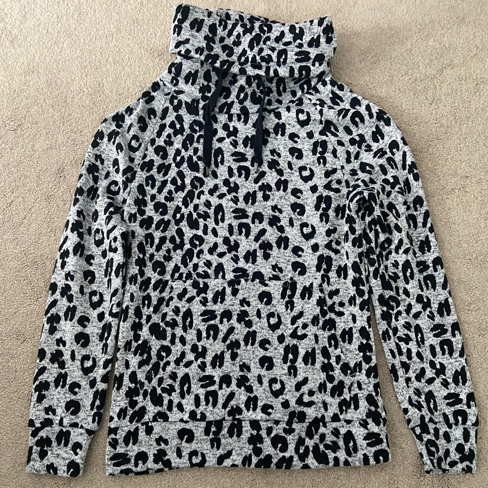 cheetah print turtle neck sweater with pockets
